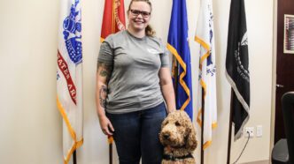 Ashley Johnson, a Clemson senior, along with service dog Aubrey in the Student Veterans Center
