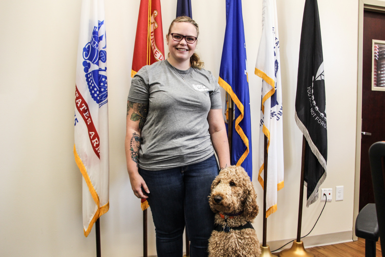 Ashley Johnson, a Clemson senior, along with service dog Aubrey in the Student Veterans Center