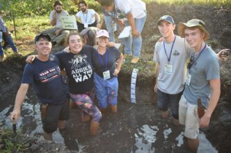 Recent Clemson alum Ann Scott (pink hat) took first in international soil judging competition.