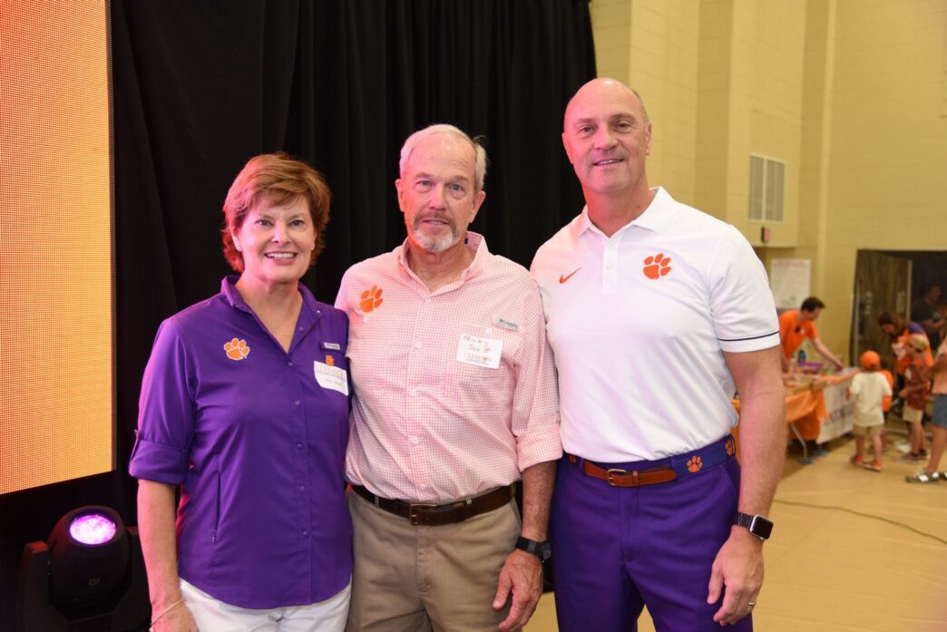Amy and Micky Scott are with Clemson President James P. Clements at Saturday's College of Agriculture, Forestry and Life Sciences tailgate.