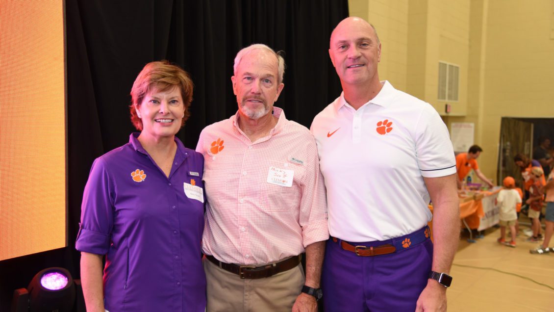 Amy and Micky Scott are with Clemson President James P. Clements at Saturday's College of Agriculture, Forestry and Life Sciences tailgate.