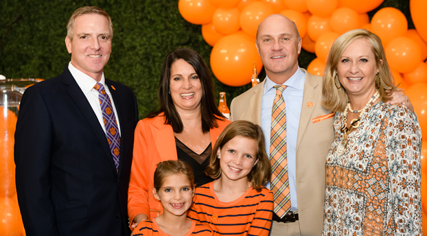 Ben and Cheri Phyfer (left) and their daughters, Danielle and Allison are pictured with President James P. and First Lady Beth Clements.