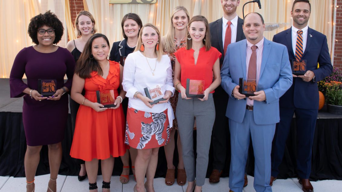 The Clemson Young Alumni Council 2018 Roaring 10 are (front row from left) France L. Jackson, Noelle Cabato Holdsworth, Claire Reddeck Bowman, Aliza Darnell McGuire and Don Allen Sharpe Jr.; (second row) Angela Gillis (accepting the award for Tyrone Oliver Gayle, who could not attend), Susan Ridgeway Nunamaker, Allison Marshall Puechl, Dan "McKee" McKeithan Thomason Jr. and John B. Wright Jr.