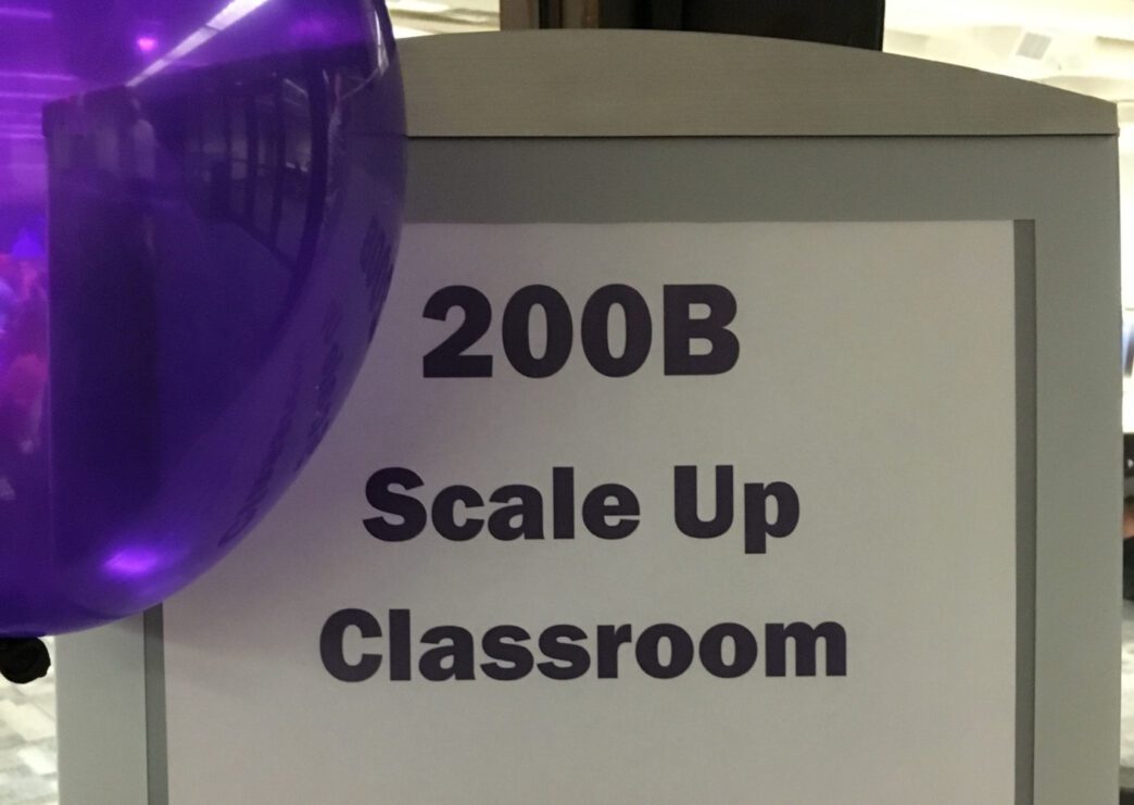 The SCALE-UP classroom, which stands for Student-Centered Activities for Large Enrollment Undergraduate Programs, is equipped with 16 tables that each seat nine students. Every table is also equipped with three interactive monitors.