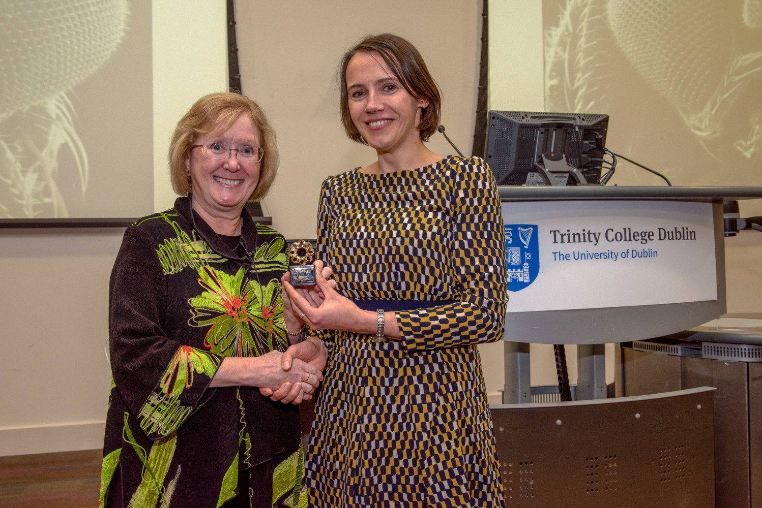Trudy Mackay, director of Clemson's Center for Human Genetics, receives the prestigious Dawson Prize from Dublin geneticist Aoife McLysaght.