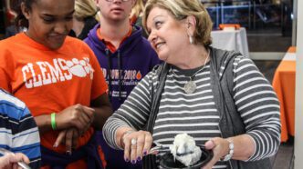 Vice President for Student Affairs Almeda Jacks serving ice cream to students from the ClemsonLIFE program.