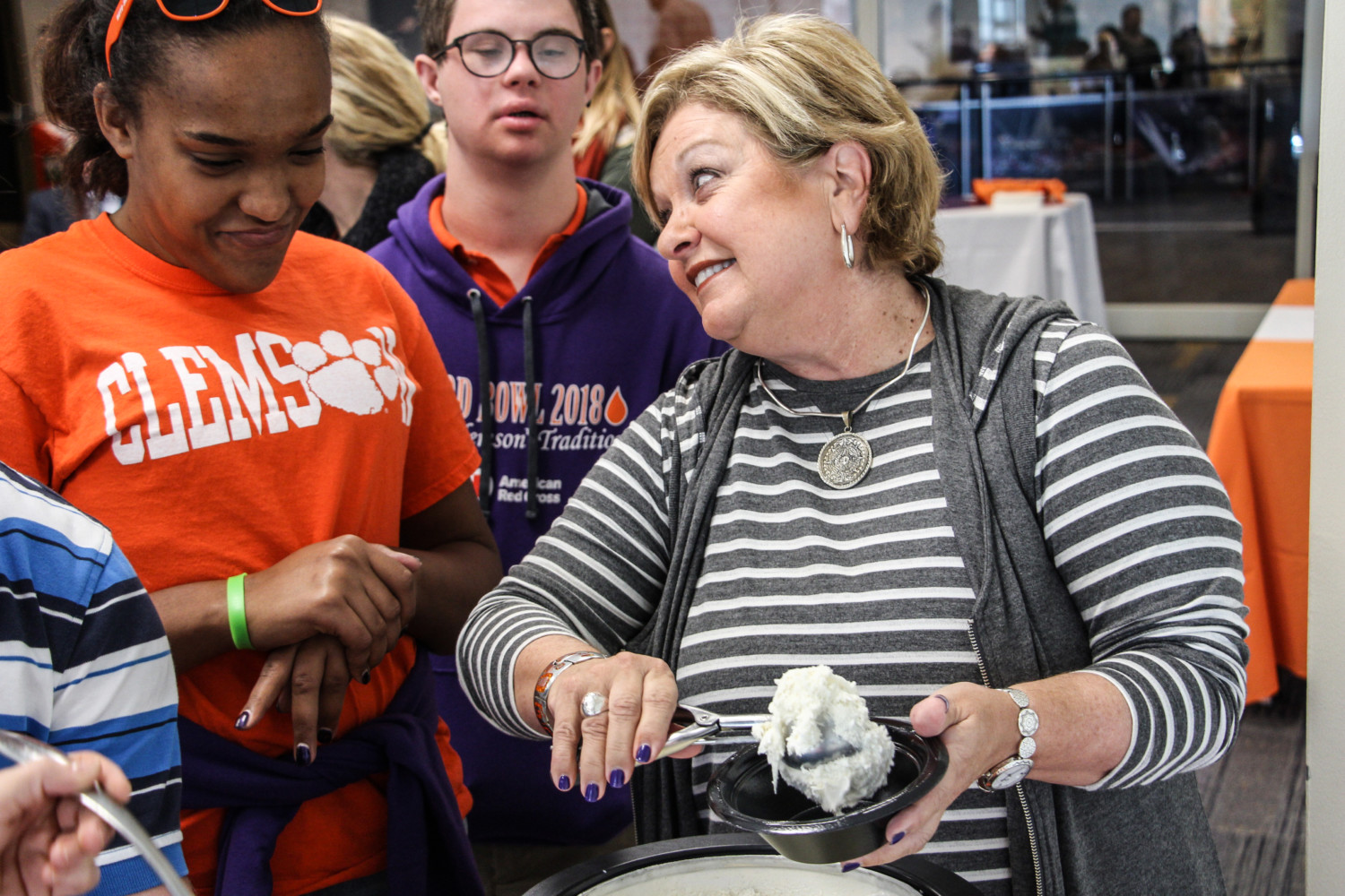 Vice President for Student Affairs Almeda Jacks serving ice cream to students from the ClemsonLIFE program.