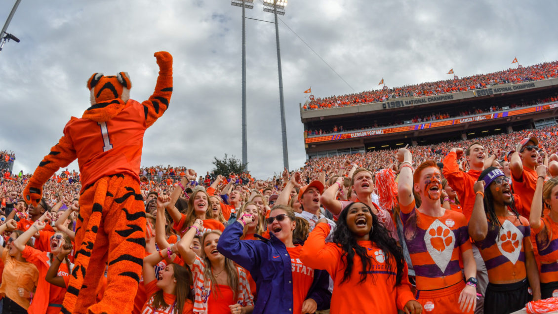 Members of the Clemson student body cheer on the Tigers at a football game against South Carolina on Nov. 24, 2018.