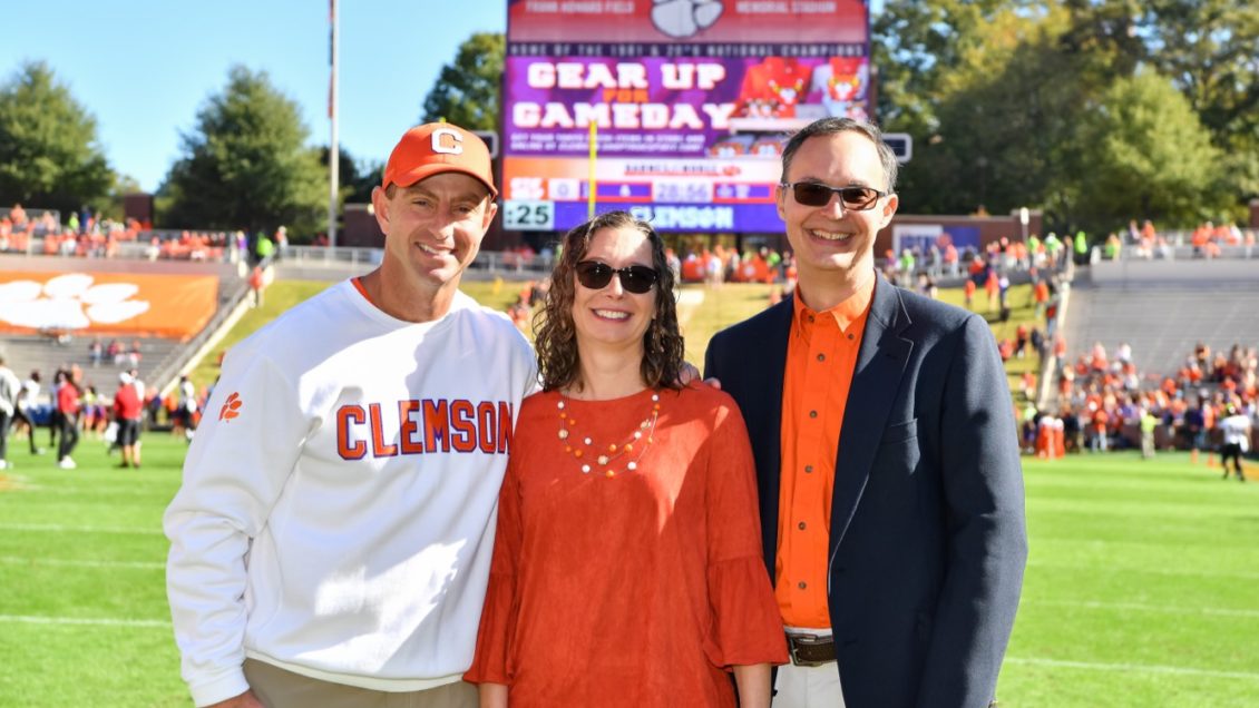 Pope (middle) poses with Clemson Football Head Coach Dabo Swinney (left).