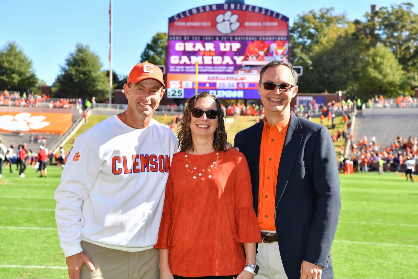 Pope (middle) poses with Clemson Football Head Coach Dabo Swinney (left).
