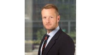 Marian Tupy speaking at Hayek Center event