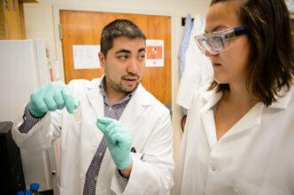 Mark Blenner, left, is receiving the U.S. government's highest honor for early-career scientists and engineers, the Presidential Early Career Award for Scientists and Engineers.