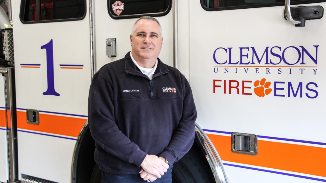 Bill Daniel, chief of Clemson Fire/EMS, in front of a fire truck at the Perimeter Road station on Dec. 6, 2018.
