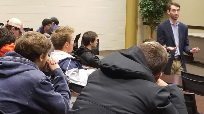 Reed Watson of The Hayek Center speaks to Business 1010 students