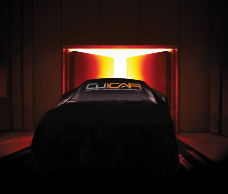 Image of covered car with CU-ICAR logo