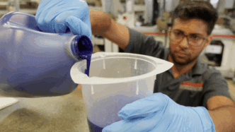 A Clemson University graduate student formulates ink in the Sonoco Institute's Advanced Print Lab