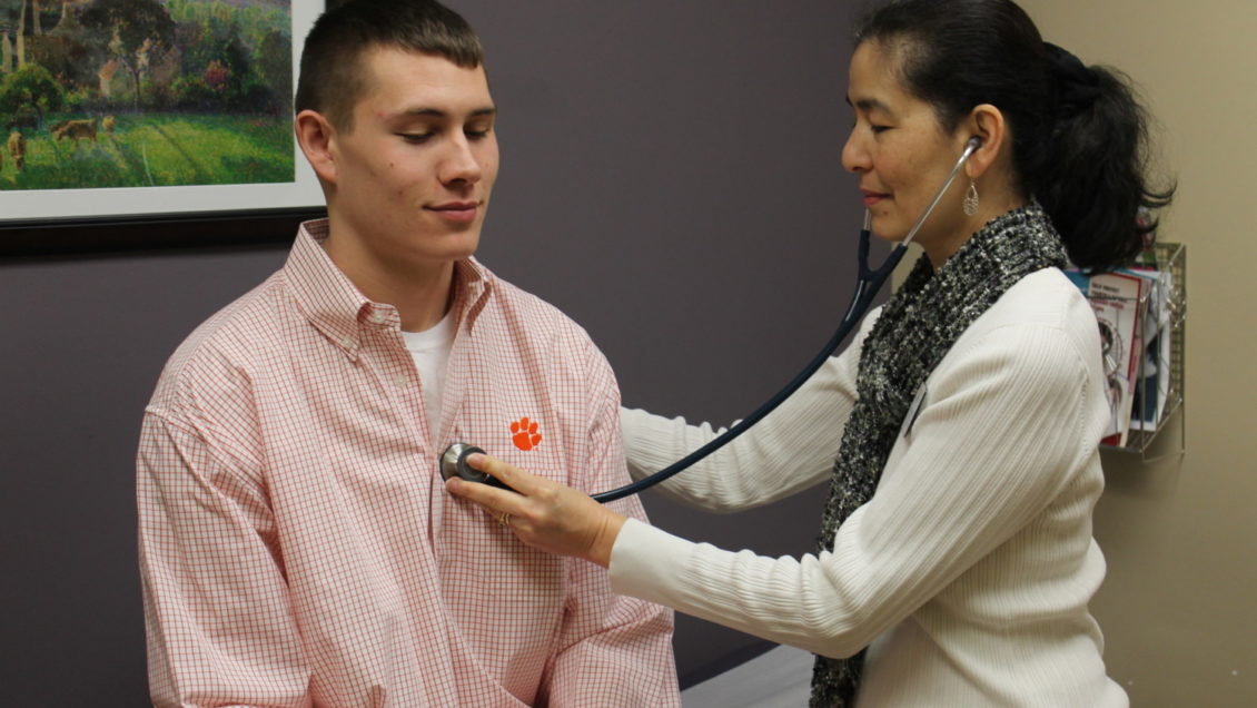 A Clemson student in a medical exam at Redfern Health Center in 2017.