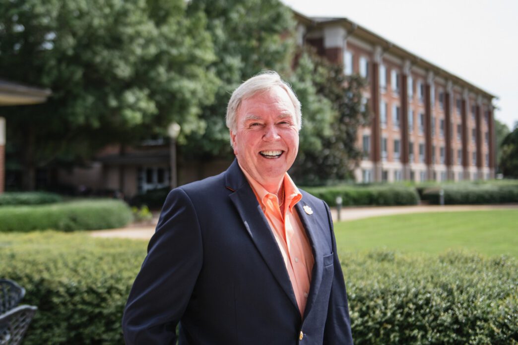 Ray Anderson smiles outside the Madren Center.