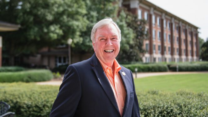 Ray Anderson smiles outside the Madren Center.