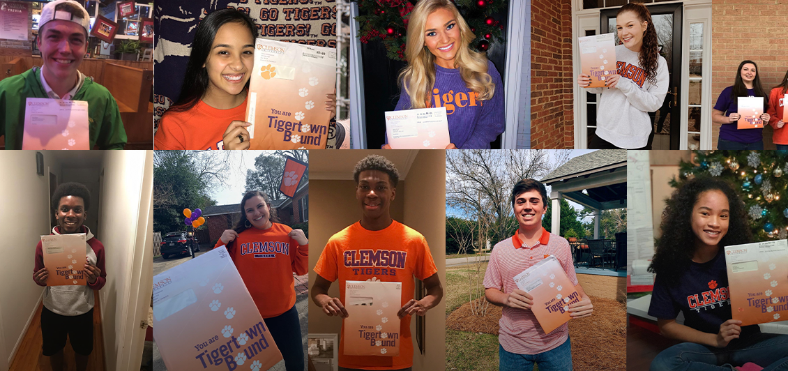 A collection of future Clemson students holding their orange and purple acceptance packets and smiling in excitement.