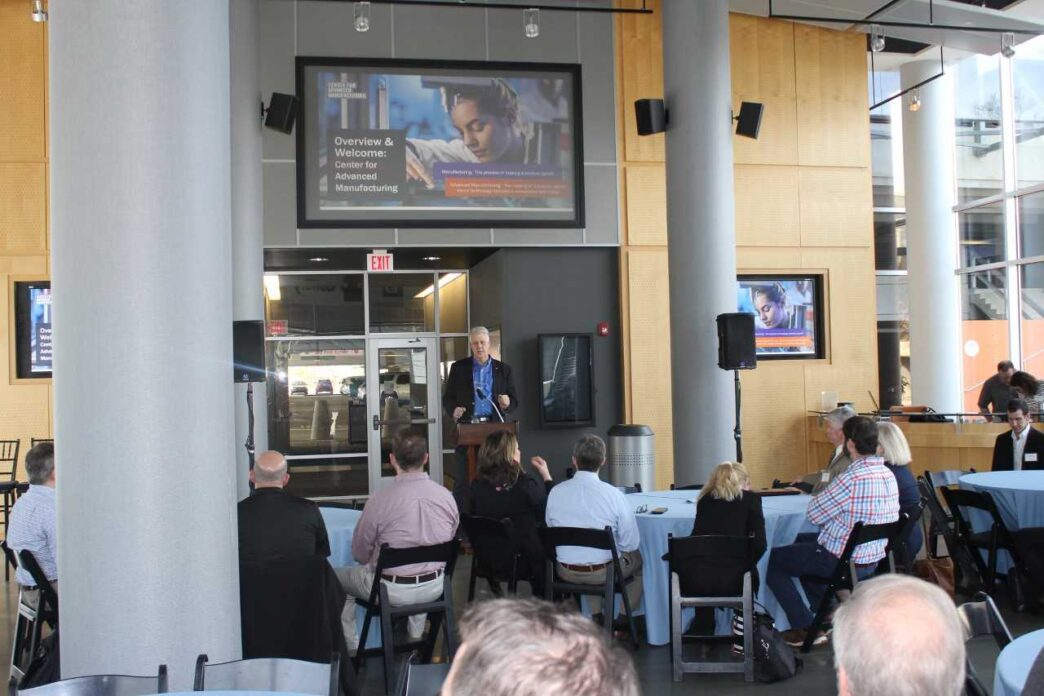 Mark Johnson, director of the Center for Advanced Manufacturing, addresses the crowd gathered for the Cornerstone Workshops on Product Lifecycle Management (PLM) and on University-Level Education Opportunities.