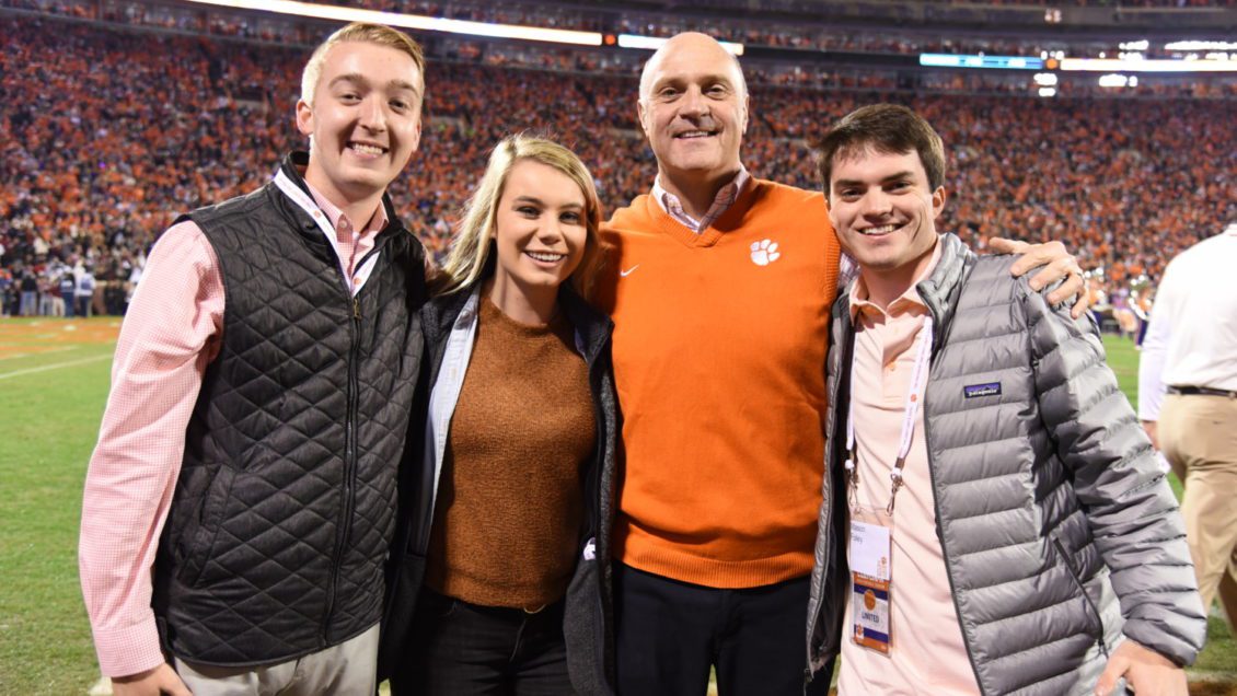 (L-R) Parker Tilley, Logan Young, President Jim Clements and Mason Foley at a Clemson football game in the fall of 2018.