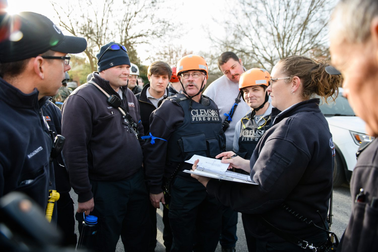 Jessica Landreth of Clemson University Fire Department provides instructions to a team on March 19 as part of an active shooter exercise on campus.