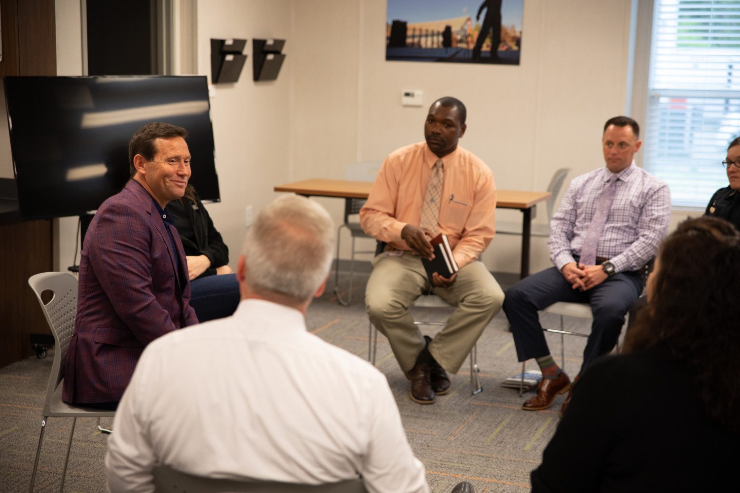 Jon Gordon, noted speaker and author, visits with members of CUPD on April 5, 2019.