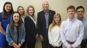 Sales Club leadership team pictured with dean and Dan Garrison