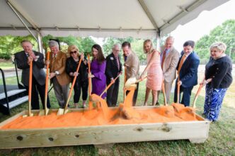 (L-R) Roy McCall, Charles Barker, Susan Barker, Mary Cadden, Melvin Younts, Ken Cadden, Beth Clements, Jim Clements, Matt Gabriel and Almeda Jacks participate in a ceremonial groundbreaking on May 23, 2019 for the Samuel J. Cadden Chapel.