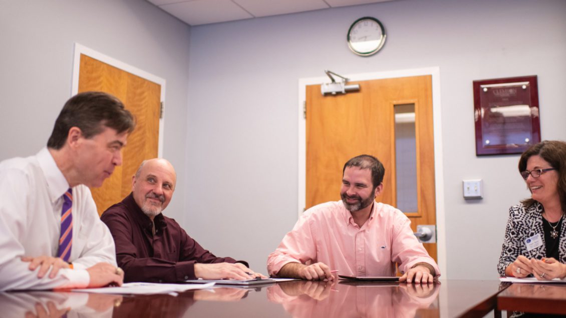 From left: Timothy Fulford of Trident Technical College, Joe Santaniello of Spartanburg Community College, Christopher Kitchens of Clemson University and Shawn Masto of Spartanburg Community College meet in Clemson University’s Earle Hall to plan SPECTRA, a program that makes $3 million in new scholarships available to students who transfer from technical colleges to Clemson to study engineering or computing.