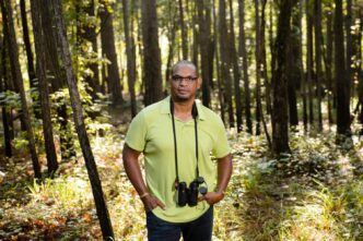 Drew Lanham with binoculars for birding.