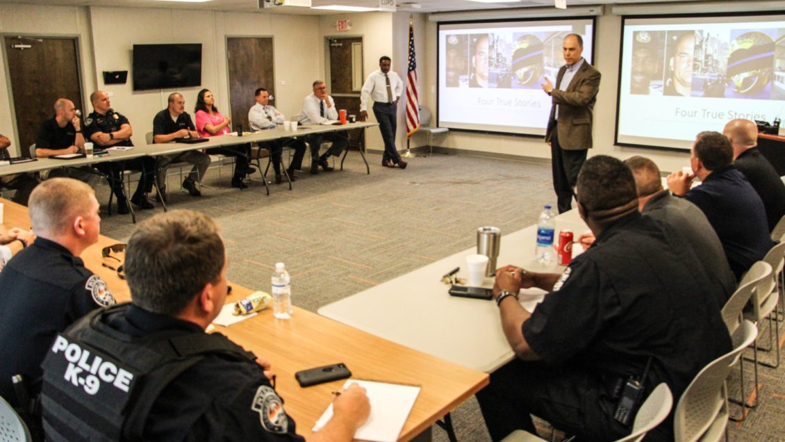 Jonathan Aronie (speaking) and Otha Sandifer presented recently to Clemson University Police Department and other partners on the integration of skills and practices that make up ethical policing.