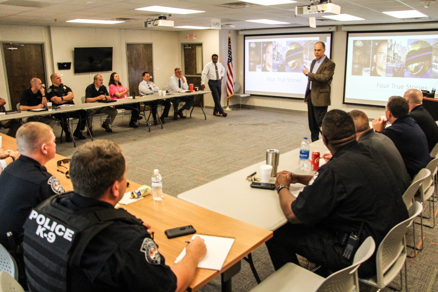 Jonathan Aronie (speaking) and Otha Sandifer presented recently to Clemson University Police Department and other partners on the integration of skills and practices that make up ethical policing.