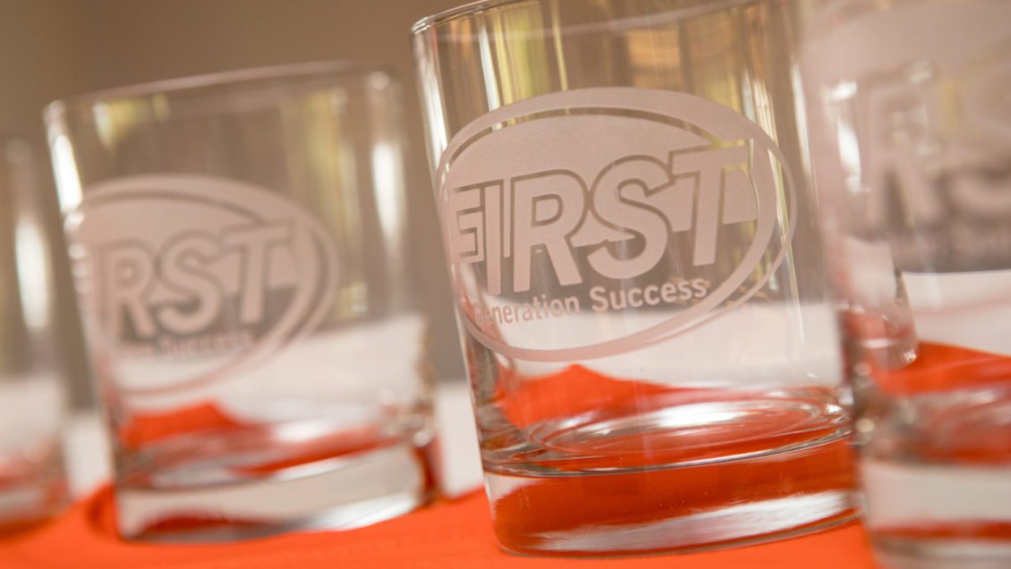 Glasses with the First-Generation Student Success logo