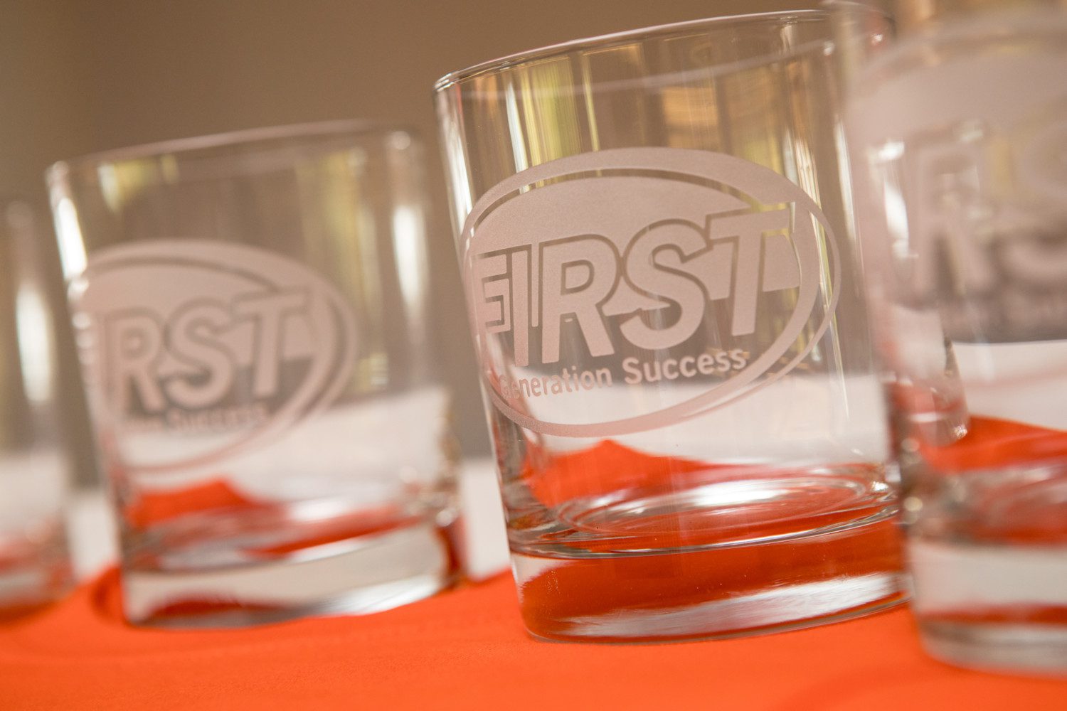 Glasses with the First-Generation Student Success logo