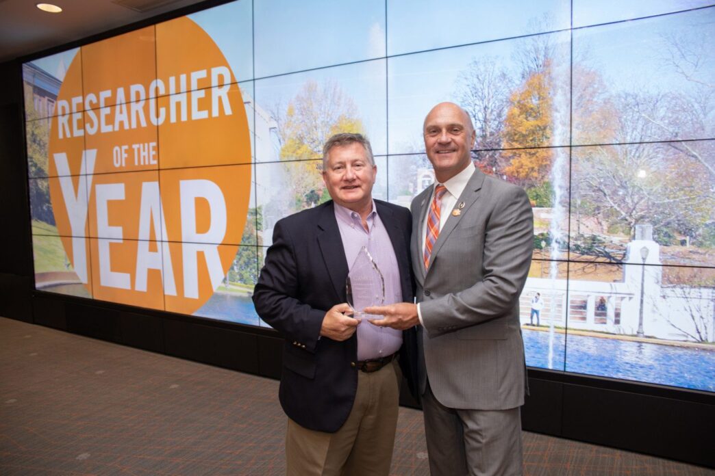 Chemistry Professor Ken Marcus and Clemson University President James P. Clements pose for a photo during the Researcher of the Year awards ceremony.