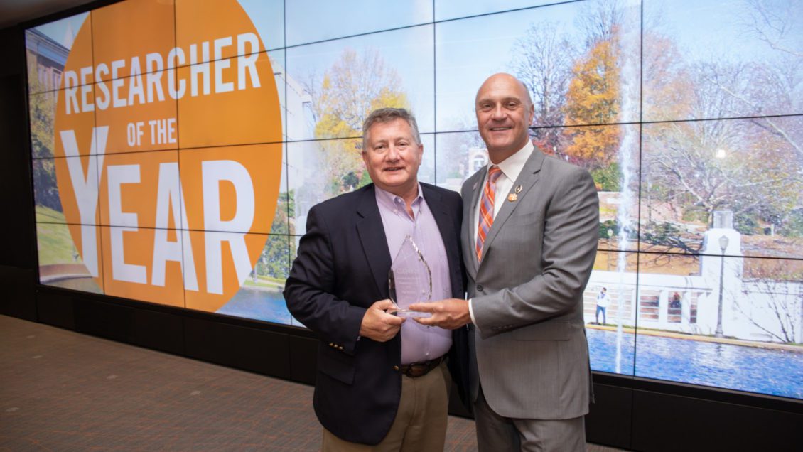 Chemistry Professor Ken Marcus and Clemson University President James P. Clements pose for a photo during the Researcher of the Year awards ceremony.