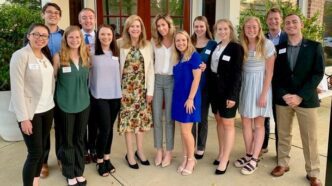 Student Advisory Board members meet at year-end dinner with Dean Wendy York