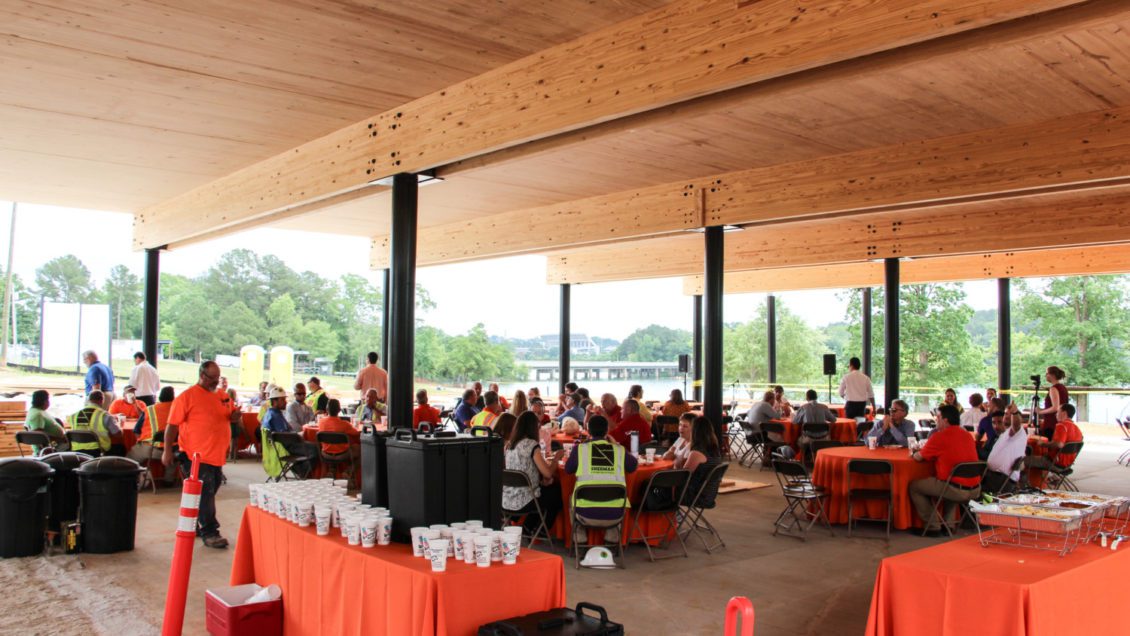 Members of Sherman Construction, Campus Recreation and other project stakeholders came together May 8 to celebrate progress on the 16,500-square foot Outdoor Education Center, located at the Snow Family Outdoor Fitness and Wellness Center.