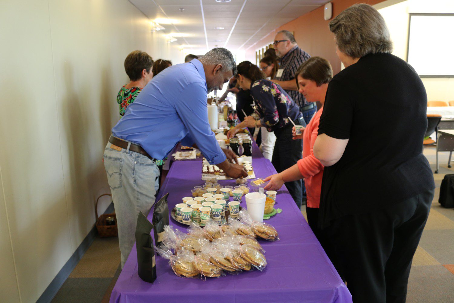 Recent graduates of Clemson's Food2Market program bring their creations for other participants to taste during a networking session at Clemson's Sandhills REC.
