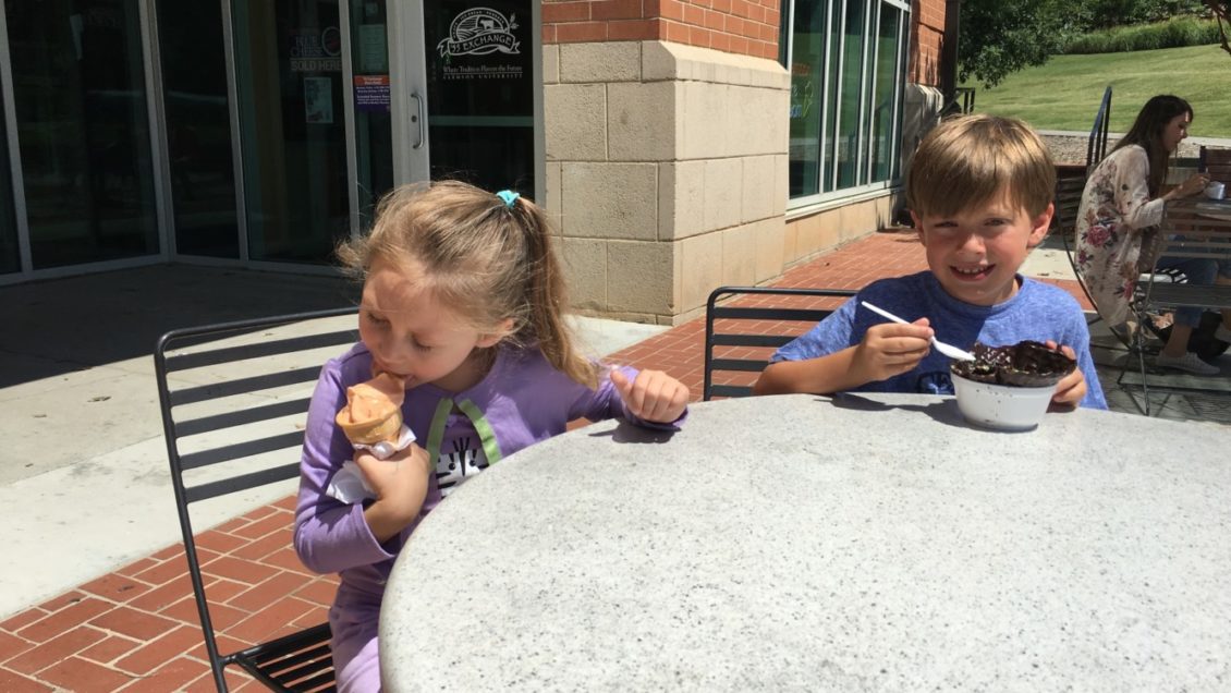 Cousins Olivia Bellinger, 4, of Stanton, Virginia and Wyatt Kilgore, 7, of Franklin, Tennessee, enjoy eating Clemson ice cream from the Class of ’55 Exchange. The Exchange will hold its annual "I Pledge for Ice Cream" from 3 p.m. to 5 p.m. Wednesday, July 3 at the Hendrix Student Center.