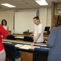 Jason Joines, a Clemson doctoral student in biological sciences and herbarium interim curator, talks about how plant specimen collections are dried, pressed and documented for use in the herbarium.