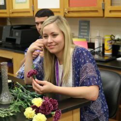 Willow Klein of Warrensburg-Latham HS in Mount Pulaski, IL produces a boutonniere she created during the Floral Design Techniques session of the 2019 STEM it UP! Conference at Clemson University.