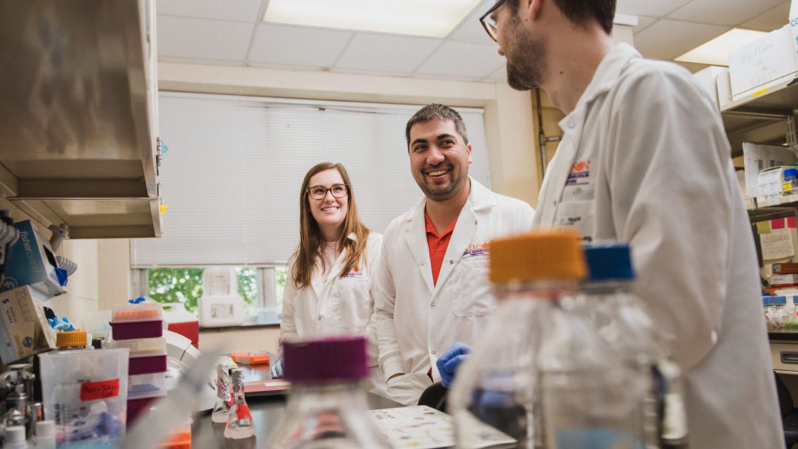 Mark Blenner (center) works in his lab with students Lexie Adams (left) and Will Burnette.