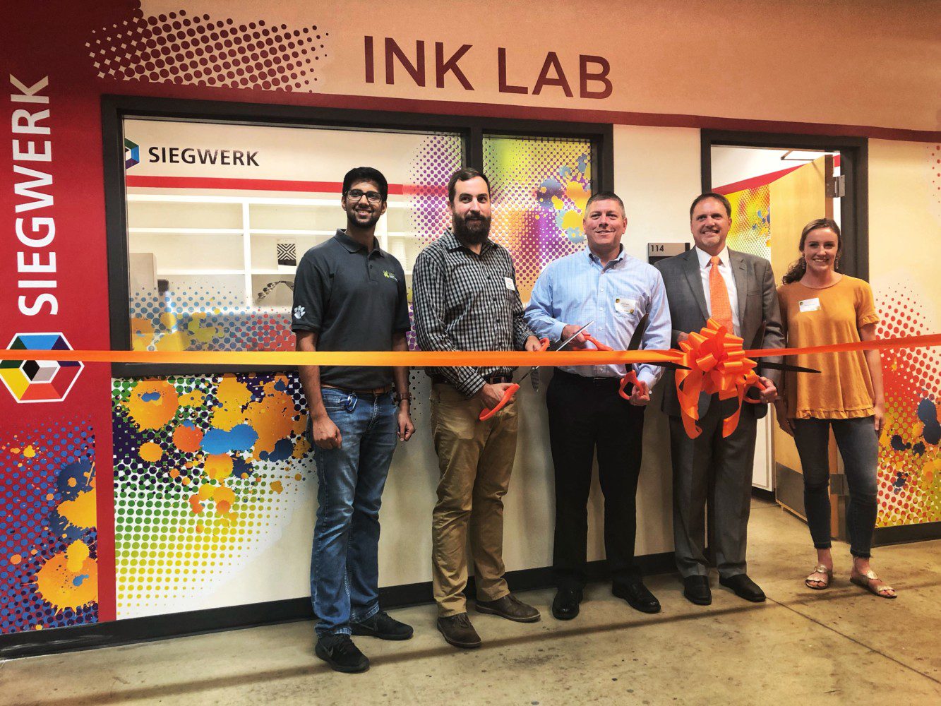 Clemson and Siegwerk reps cut a ribbon at the new Siwegwerk Ink Lab