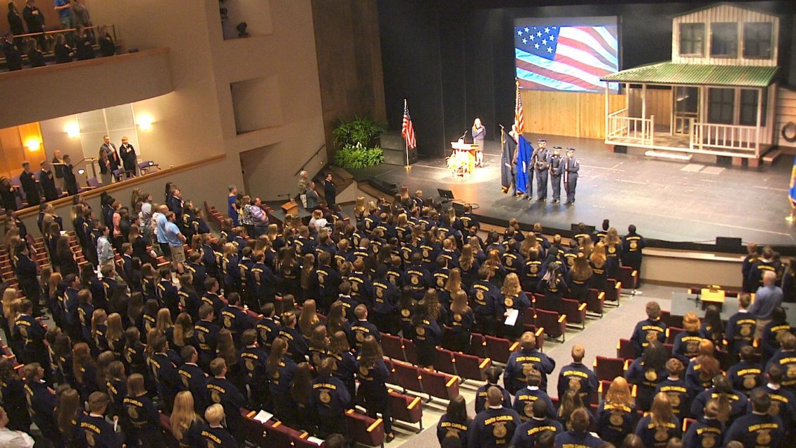 Gold and blue corduroy jackets, an FFA trademark for generations, gather for a patriotic start to the annual state convention.