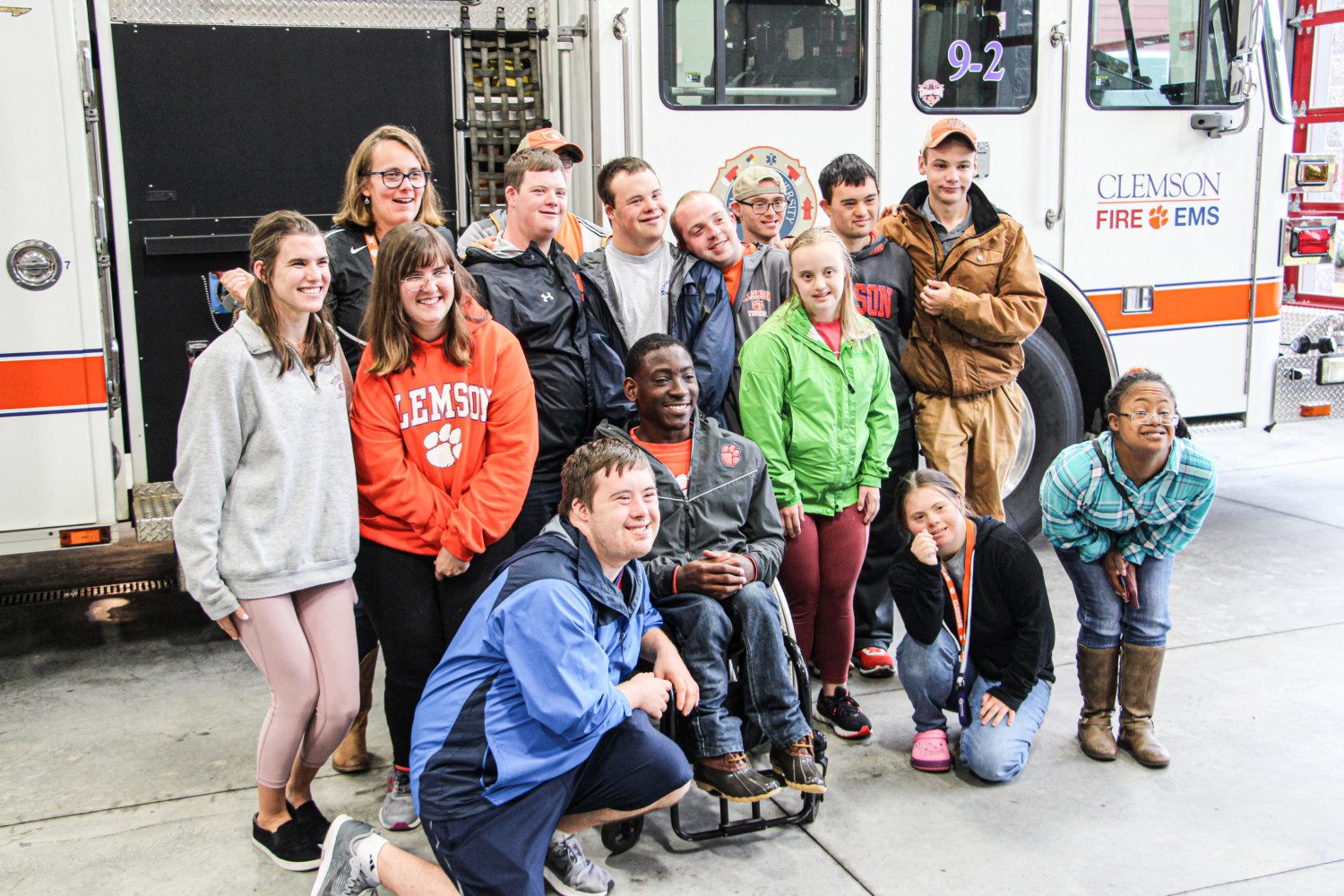 Members of ClemsonLIFE pose in front of a fire engine at Station No. 2 in Clemson on Wednesday, Oct. 30