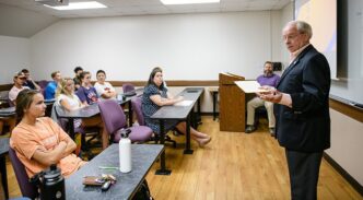 Joe Turner of Rutland Institute speaks to Bus-1010 students