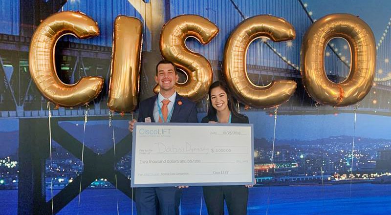 Chris Breemen, Emma Lee with first-place check from Cisco competition